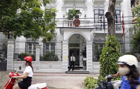 Security stands guard in front of the Denmark embassy in Hanoi