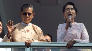 Yangon : Leader of Myanmar's National League for Democracy party, Aung San Suu Kyi, delivers a speech with party patron Tin Oo, left, from a balcony of her party headquarters in Yangon, Myanmar, Monday, Nov. 9, 2015. With tremendous excitement and hope, millions of citizens voted Sunday, Nov. 8 in Myanmar's historic general election that will test whether the military's long-standing grip on power can be loosened, with opposition leader Suu Kyi's party expected to secure an easy victory. AP/PTI(AP11_9_2015_000012B)