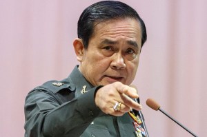 Thailand's Prime Minister Prayuth Chan-ocha gestures as he speaks during an event titled "The Instruction on the Procedures of Members of the National Reform Council" at the Army Club in Bangkok September 4, 2014. Prayuth on Thursday set out broad criteria for the selection of a 250-member council to draw up sweeping political reforms and approve a new constitution, saying people from all walks of life would be included. REUTERS/Athit Perawongmetha (THAILAND - Tags: POLITICS MILITARY) - RTR44VJ8